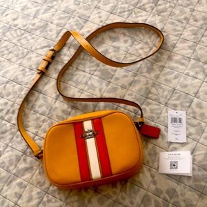 Coach Varsity stripe Crossbody bag. New with tag. Never used. Sport stripe.